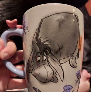 Very sweet Eeyore mug with bow on the handle official Disney.